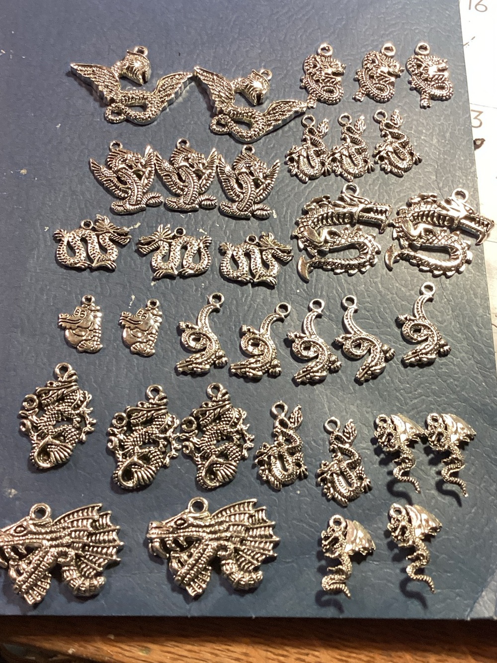 Lot of dragon charms for crafts